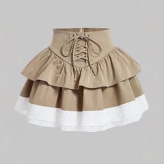 Ārējās tirdzniecības sieviešu apģērbu šūšanas svārki ar krāsu bloku, mežģīņu vidukļa svārki un asimetriska apakšmala, modes lamināra svārki, cieša jostasvieta
