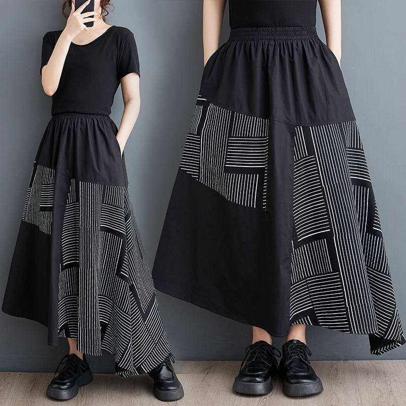 Tikras 2025 m. pavasario ir rudens naujo korėjietiško stiliaus marginto laisvo, plius dydžio, lopų dizaino universalaus moteriško midi sijono kadras.