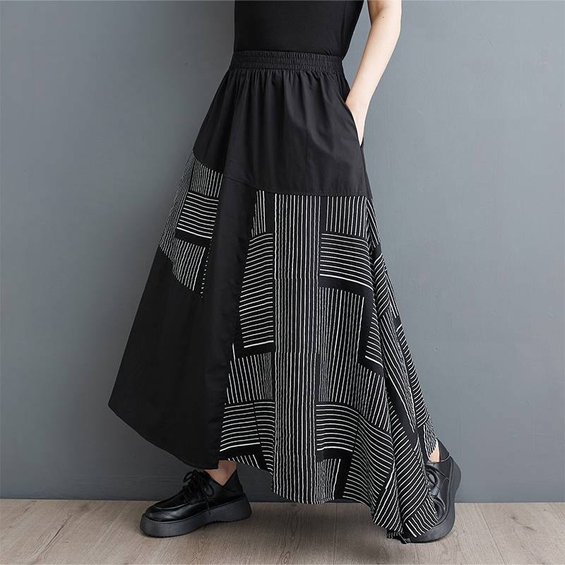 Tikras 2025 m. pavasario ir rudens naujo korėjietiško stiliaus marginto laisvo, plius dydžio, lopų dizaino universalaus moteriško midi sijono kadras.