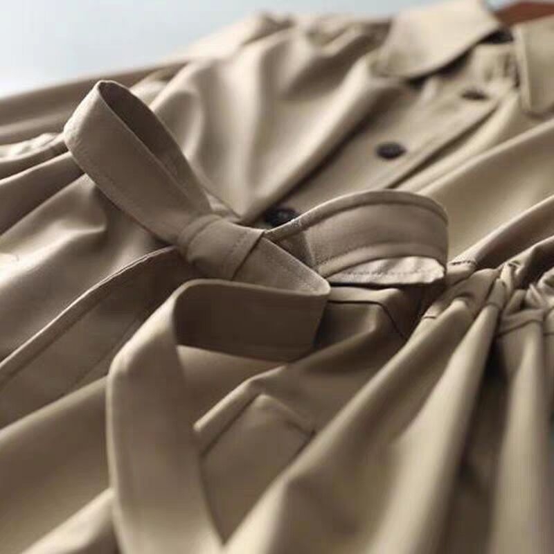 2025 m. pavasario ir rudens naujas madingas amžių mažinantis elegantiškas vidutinio ilgio moteriškas lietpaltis su raišteliu surišamu juosmeniu, liekninantis, vieneilis moteriškas švarkelis