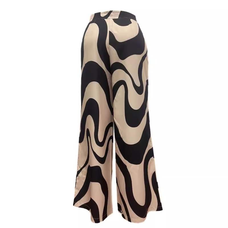 Jesen 2024., europski i američki novi stil, odmor, putovanja uz more, ležerne prugaste hlače s printom i širokim nogavicama koje pokazuju duge noge