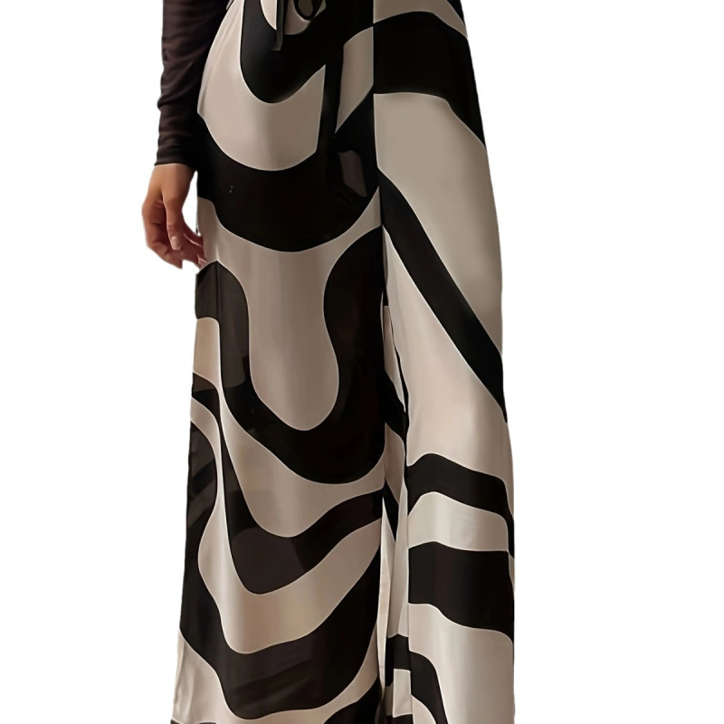 Jesen 2024., europski i američki novi stil, odmor, putovanja uz more, ležerne prugaste hlače s printom i širokim nogavicama koje pokazuju duge noge