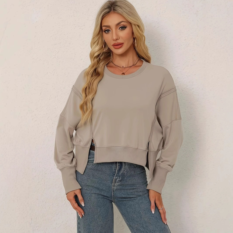 Ženske kratke majice s dugim rukavima u jednoj boji s bočnim prorezom iz Amazona 2025. prikladne su za odmor i ležerno nošenje.