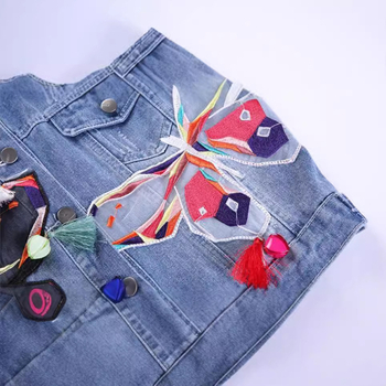 Tavaszi és őszi új női nehézipari szalaggal hímzett pillangós rügy bojtos rövid, minden mérkőzésre alkalmas, lezser farmerdzseki