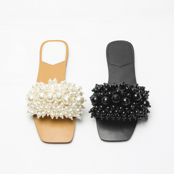 Naiste kandiliste ninaosadega helmestega romantilised valged lamedad rannasussid väliskaubanduseks, saadaval otsetarnetamiseks, mugavad lamedad kingad naistele