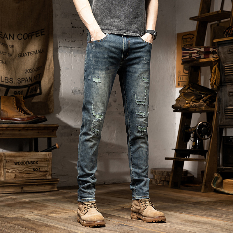 Xintang Új Érkezés Szakadt Hímzett Farmer Férfi Koreai Stílusú Trendi Stretch Slim-Fit Alkalmi Hosszú Nadrág Kis Lábakkal