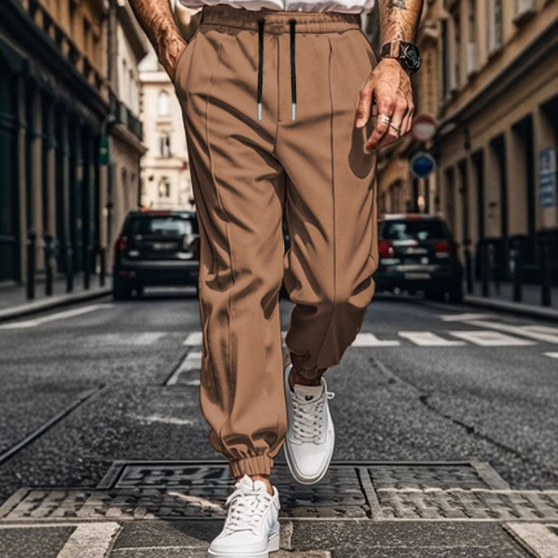 2025. aasta piiriülesed uued meeste sügis- ja talvespordi meeste vabaajapüksid, ühevärvilised püksid, noorte populaarsed lahtised keskmise vöökohaga püksid