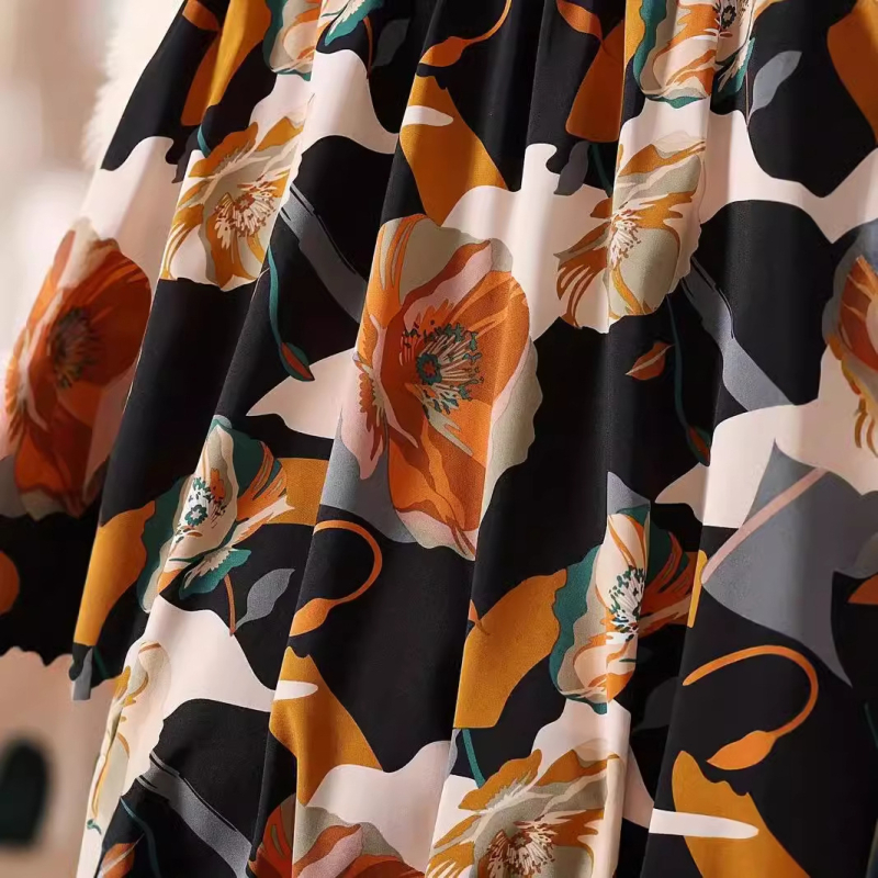 2024 új tavaszi és nyári enyhén átlátszó, rugalmas derékkal ellátott, nyomtatott hosszú szoknya, az ingázáshoz a legkönnyebben illeszkedő A-szegélyű szoknya, esernyőszoknya, női ruházat