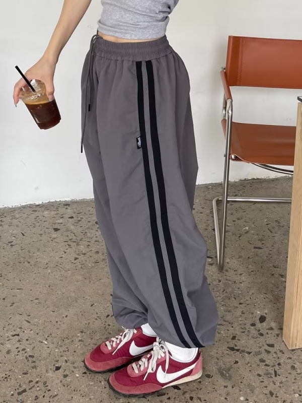 Ameerika hiphop tasloni kiiresti kuivavad triibulised spordipüksid meestele suvised jääsiidist langevarjuga sõduri tööriistadega vabaajapüksid naistele