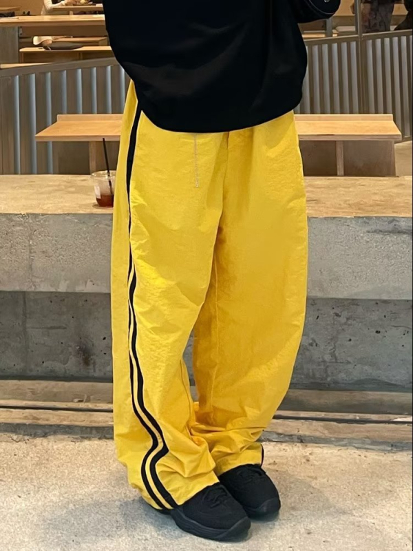 Ameerika hiphop tasloni kiiresti kuivavad triibulised spordipüksid meestele suvised jääsiidist langevarjuga sõduri tööriistadega vabaajapüksid naistele