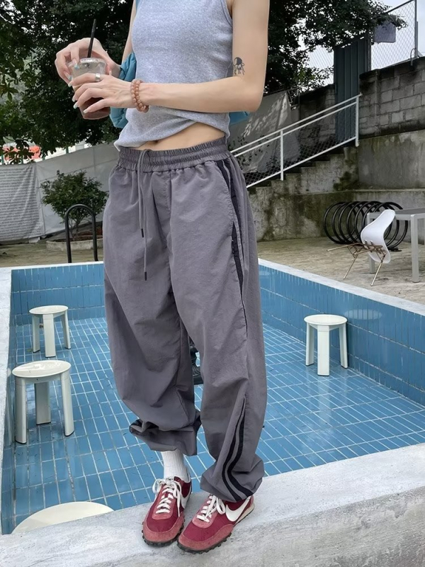 Ameerika hiphop tasloni kiiresti kuivavad triibulised spordipüksid meestele suvised jääsiidist langevarjuga sõduri tööriistadega vabaajapüksid naistele