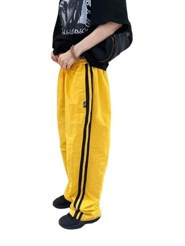 Ameerika hiphop tasloni kiiresti kuivavad triibulised spordipüksid meestele suvised jääsiidist langevarjuga sõduri tööriistadega vabaajapüksid naistele