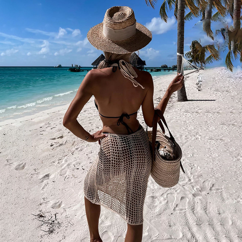 2024 tavaszi és nyári új európai és amerikai pántos kötött üreges strandruha, hát nélküli szexi ruha, egylépcsős ruha, blúz, női