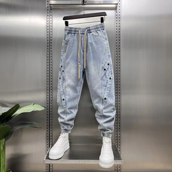 Jinbukang tavaszi és nyári új férfi jellegzetes Harlan farmernadrág divatos, trendi, márkás varrással, háromdimenziós szabású, laza szárú nadrág