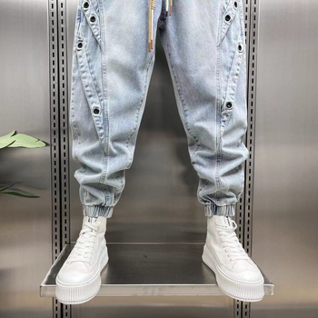 Jinbukang tavaszi és nyári új férfi jellegzetes Harlan farmernadrág divatos, trendi, márkás varrással, háromdimenziós szabású, laza szárú nadrág