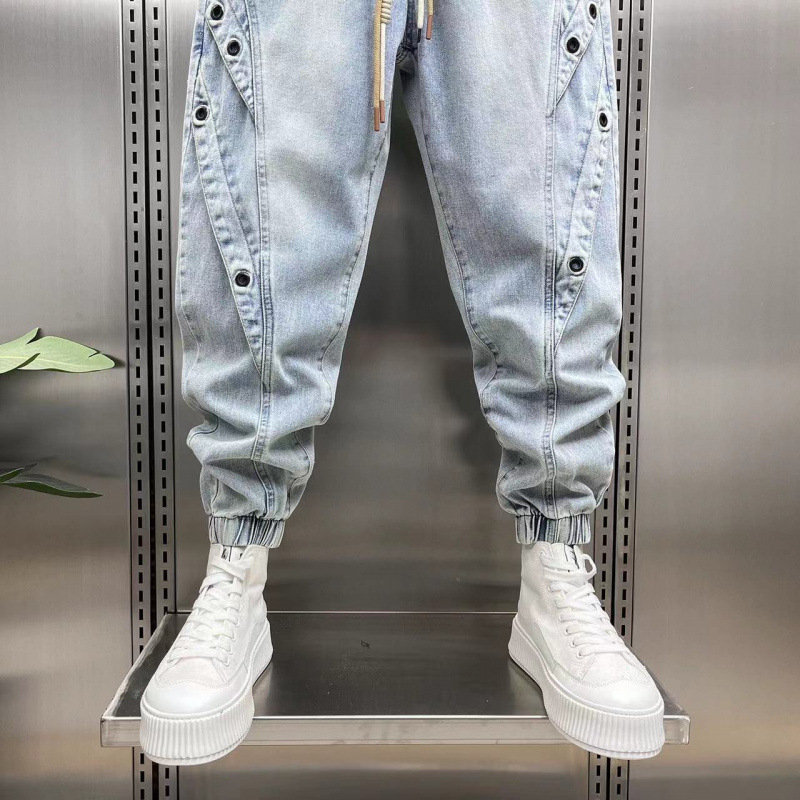 Jinbukang tavaszi és nyári új férfi jellegzetes Harlan farmernadrág divatos, trendi, márkás varrással, háromdimenziós szabású, laza szárú nadrág