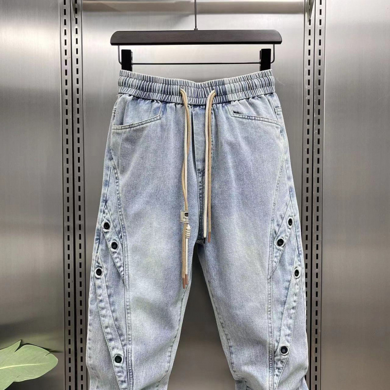 Jinbukang tavaszi és nyári új férfi jellegzetes Harlan farmernadrág divatos, trendi, márkás varrással, háromdimenziós szabású, laza szárú nadrág
