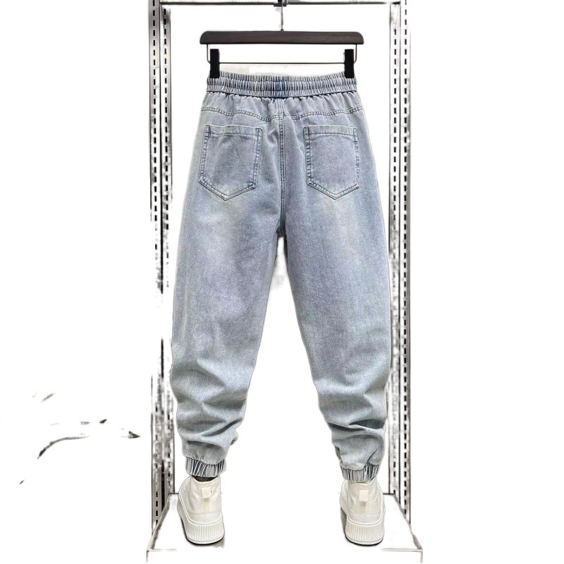 Jinbukang tavaszi és nyári új férfi jellegzetes Harlan farmernadrág divatos, trendi, márkás varrással, háromdimenziós szabású, laza szárú nadrág