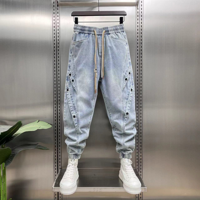 Jinbukang tavaszi és nyári új férfi jellegzetes Harlan farmernadrág divatos, trendi, márkás varrással, háromdimenziós szabású, laza szárú nadrág