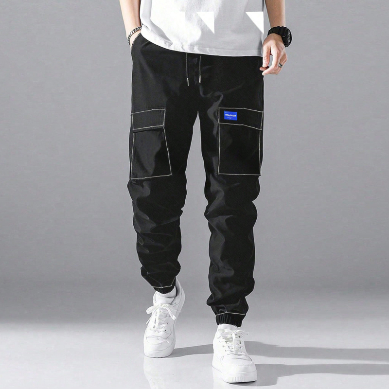 Határokon átnyúló exkluzív új, laza tavaszi és őszi amerikai stílusú kültéri férfi kopásálló divatos márkájú nadrág, alkalmi sportnadrág, divatos márka