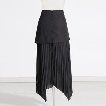 Elegáns stílusú 2025 őszi új, tiszta színű, aszimmetrikus, bojtos, rakott, középhosszú szoknya nőknek, divatos
