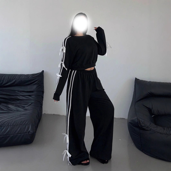 Határokon átnyúló új amerikai utcai személyiségtrend divattervezés érzék oldalsó masni karcsúsított pulóver melegítőruha