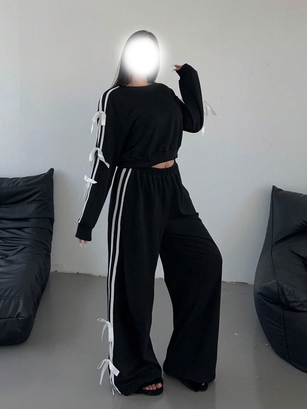 Határokon átnyúló új amerikai utcai személyiségtrend divattervezés érzék oldalsó masni karcsúsított pulóver melegítőruha