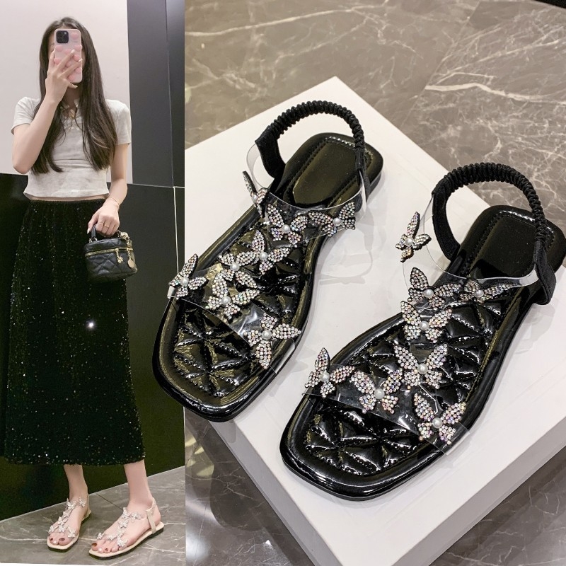 Szegélyes, pillangós, strasszos, lapos, szögletes orrú, peep toe szandálok gumiszalaggal, üreges strandszandálok, könnyű és kényelmes lapos sarkú szandálok