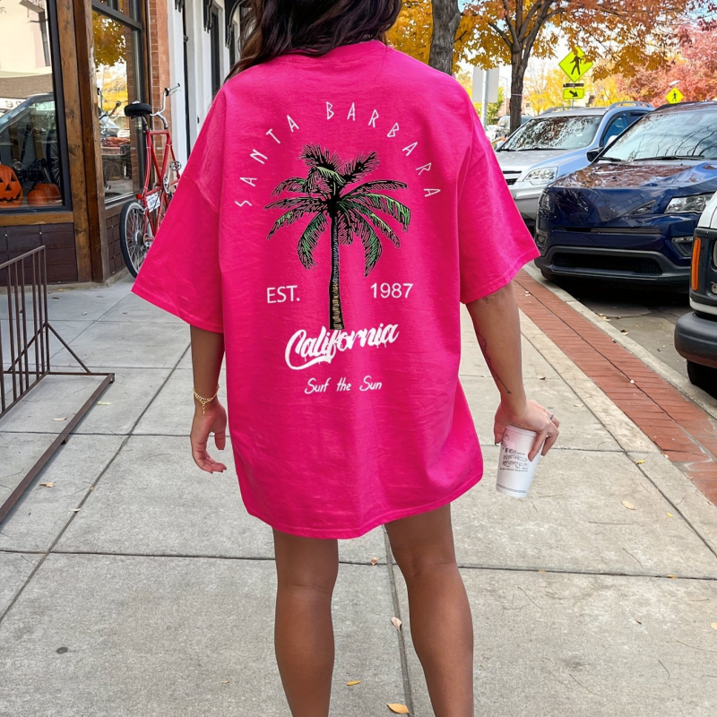 Kerek nyakú, kókuszfa mintás, keresztezett szegélyű pólóruha, tavaszi és nyári lezser, rövid ujjú, fekete női ruházat