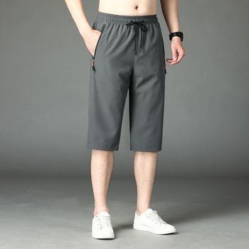 Uued meeste lahtised sirge säärega lühikesed püksid, pluss-suuruses trendikad trükitud ülerõivaste püksid 2024. aasta uus mudel