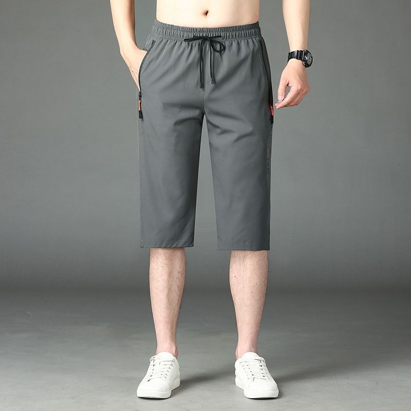 Uued meeste lahtised sirge säärega lühikesed püksid, pluss-suuruses trendikad trükitud ülerõivaste püksid 2024. aasta uus mudel