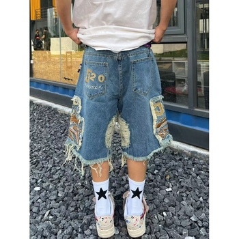 Euroopa ja Ameerika tänavamoe hiphop meeste ja naiste paaride moebrändi ripitud tikitud tutiga High Street teksariiete lühikesed püksid