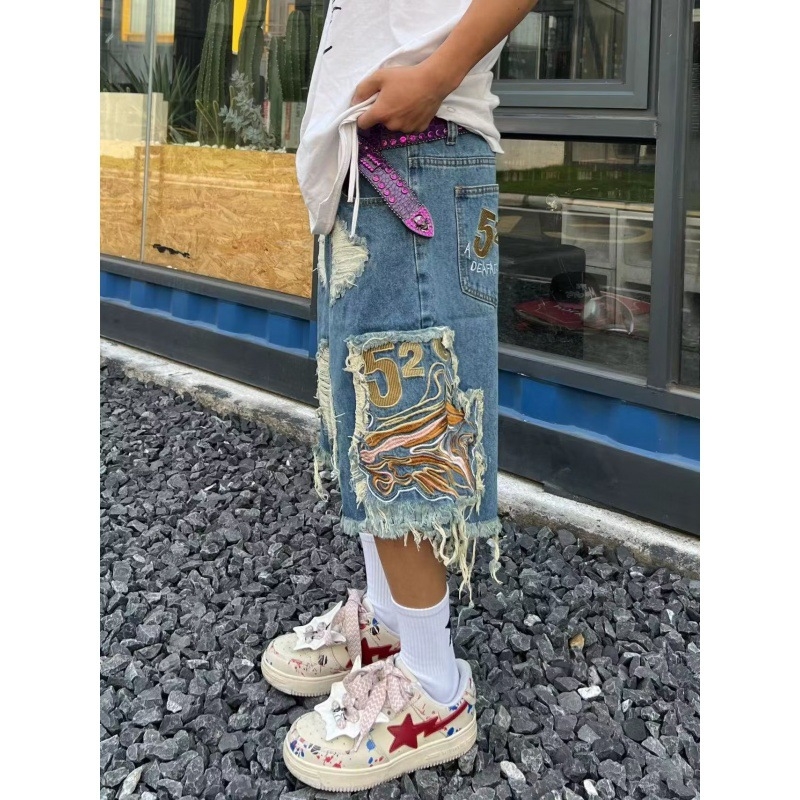 Europos ir Amerikos gatvės mados hiphopo vyrai ir moterys, poros, mados prekės ženklo plėšyti siuvinėti kutais puošti gatvės džinsiniai šortai