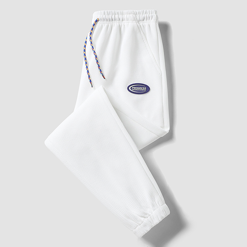 2022 Új Stílusú, forró gofrimintás divatmárka nadrág férfi tavaszi divatos sportnadrág bő orrú lezser nadrág