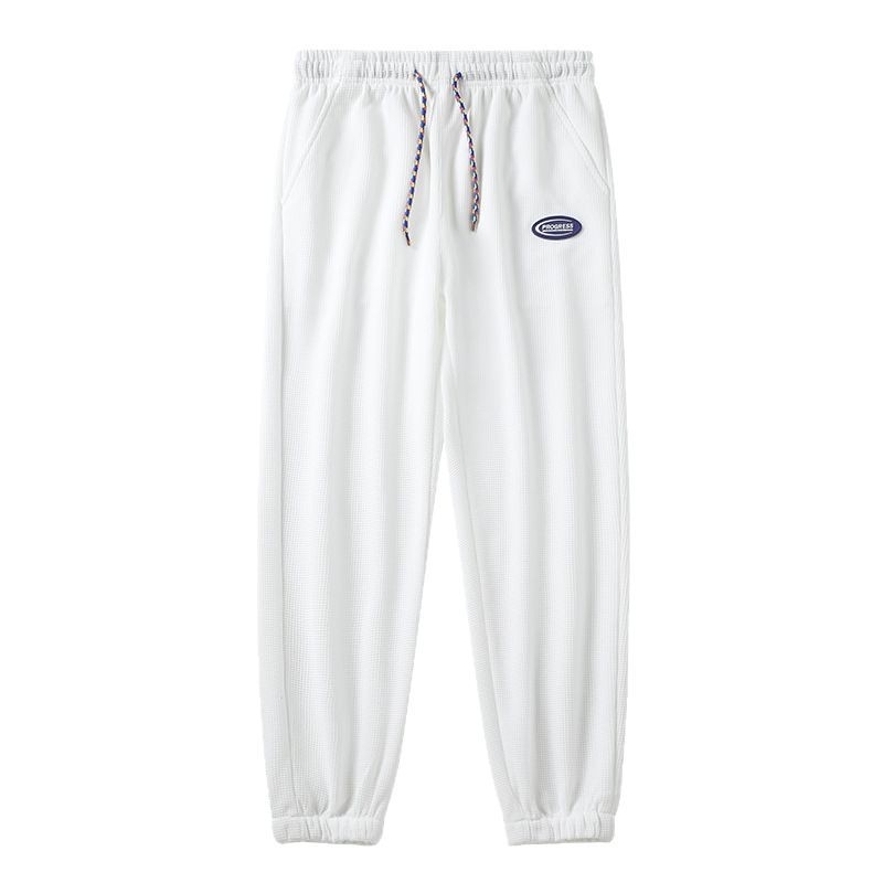 2022 Új Stílusú, forró gofrimintás divatmárka nadrág férfi tavaszi divatos sportnadrág bő orrú lezser nadrág