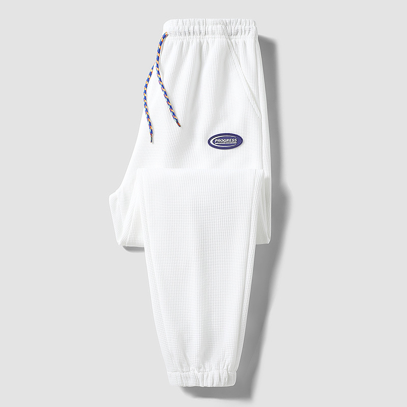 2022 Új Stílusú, forró gofrimintás divatmárka nadrág férfi tavaszi divatos sportnadrág bő orrú lezser nadrág