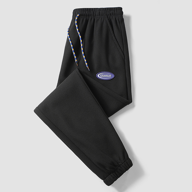 2022 Új Stílusú, forró gofrimintás divatmárka nadrág férfi tavaszi divatos sportnadrág bő orrú lezser nadrág