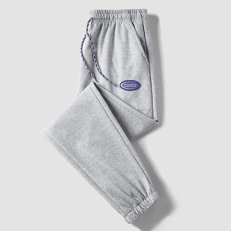 2022 Új Stílusú, forró gofrimintás divatmárka nadrág férfi tavaszi divatos sportnadrág bő orrú lezser nadrág