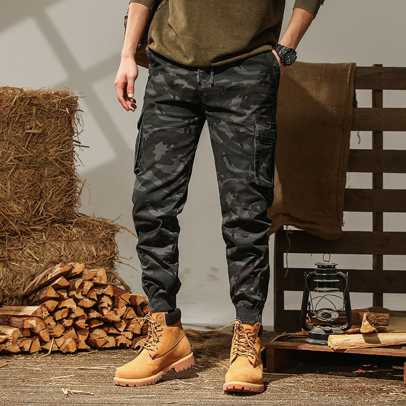 Kevad- ja sügispehmendusega kamuflaažmustriga vabaajapüksid, meeste jala tõmblukuga püksid, meeste mitme kotiga püksid, spordipüksid, puuvillased venivad püksid.