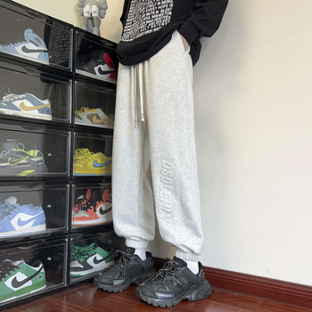 Nove proljetne muške ležerne hlače u hongkonškom stilu, mladenačke, jednobojne, jednostavne, s utisnutim slovima, labave sportske hlače s vezanjem po gležnjevima