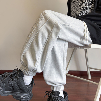 Nove proljetne muške ležerne hlače u hongkonškom stilu, mladenačke, jednobojne, jednostavne, s utisnutim slovima, labave sportske hlače s vezanjem po gležnjevima