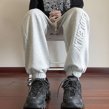 Nove proljetne muške ležerne hlače u hongkonškom stilu, mladenačke, jednobojne, jednostavne, s utisnutim slovima, labave sportske hlače s vezanjem po gležnjevima