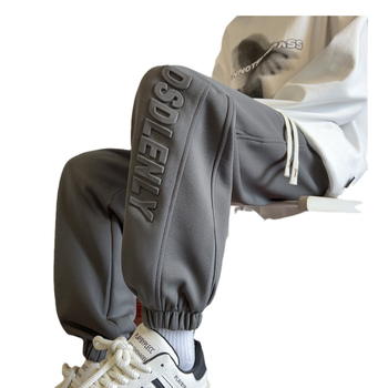 Nove proljetne muške ležerne hlače u hongkonškom stilu, mladenačke, jednobojne, jednostavne, s utisnutim slovima, labave sportske hlače s vezanjem po gležnjevima