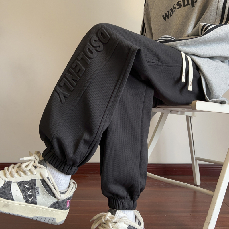 Nove proljetne muške ležerne hlače u hongkonškom stilu, mladenačke, jednobojne, jednostavne, s utisnutim slovima, labave sportske hlače s vezanjem po gležnjevima