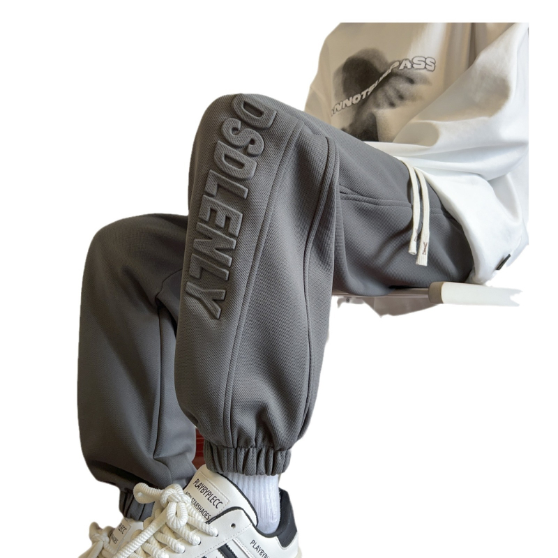 Nove proljetne muške ležerne hlače u hongkonškom stilu, mladenačke, jednobojne, jednostavne, s utisnutim slovima, labave sportske hlače s vezanjem po gležnjevima