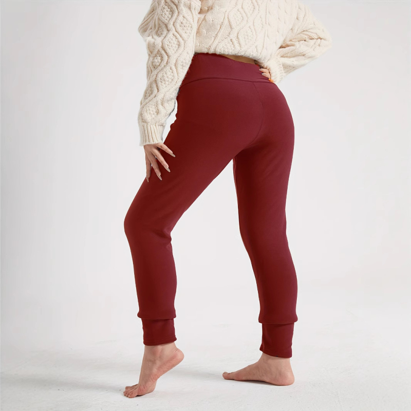 Sieviešu legingi ar augsto jostasvietu un flīsa oderi no temu eksplozijas sporta, fitnesa un jogas treniņiem.