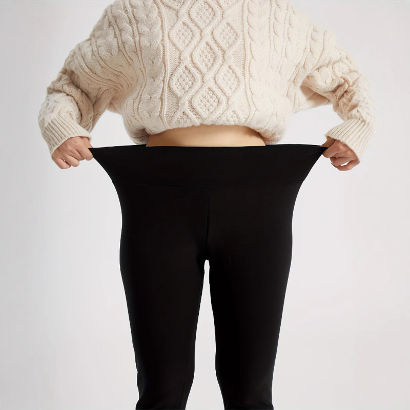 Sieviešu legingi ar augsto jostasvietu un flīsa oderi no temu eksplozijas sporta, fitnesa un jogas treniņiem.