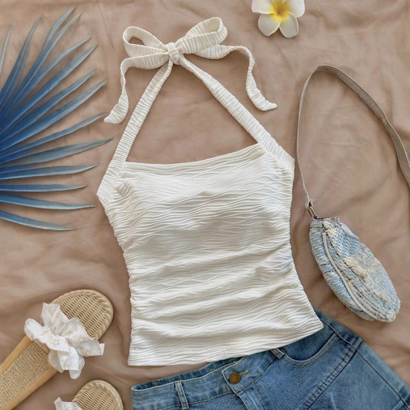 2025-ös új nyári stílusú retró köldökkiemelkedő, félnyakas, belső nadrágtartós, ujjatlan, rövid, karcsúsított mellény női felső