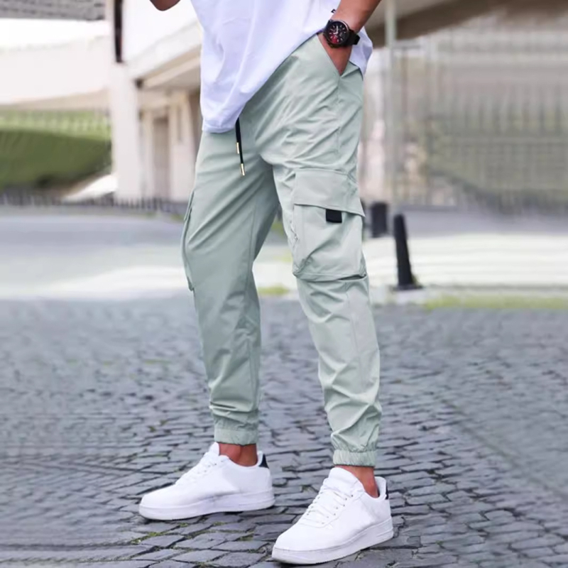 2025 Új Őszi és Téli Férfi Lezser Nadrág Leggings Tiszta Színű Nadrág Húzózsinóros Nadrág Taktikai Nadrág Több Zsebes Nadrág Munkaruházat