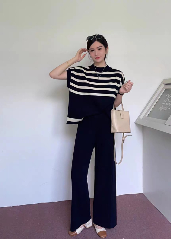 Határokon átnyúló kereskedelem Egyszerű és elegáns csíkos kötött mellényfelső + divatos, karcsúsított, bő szárú női nadrág kifinomult és professzionális megjelenéssel